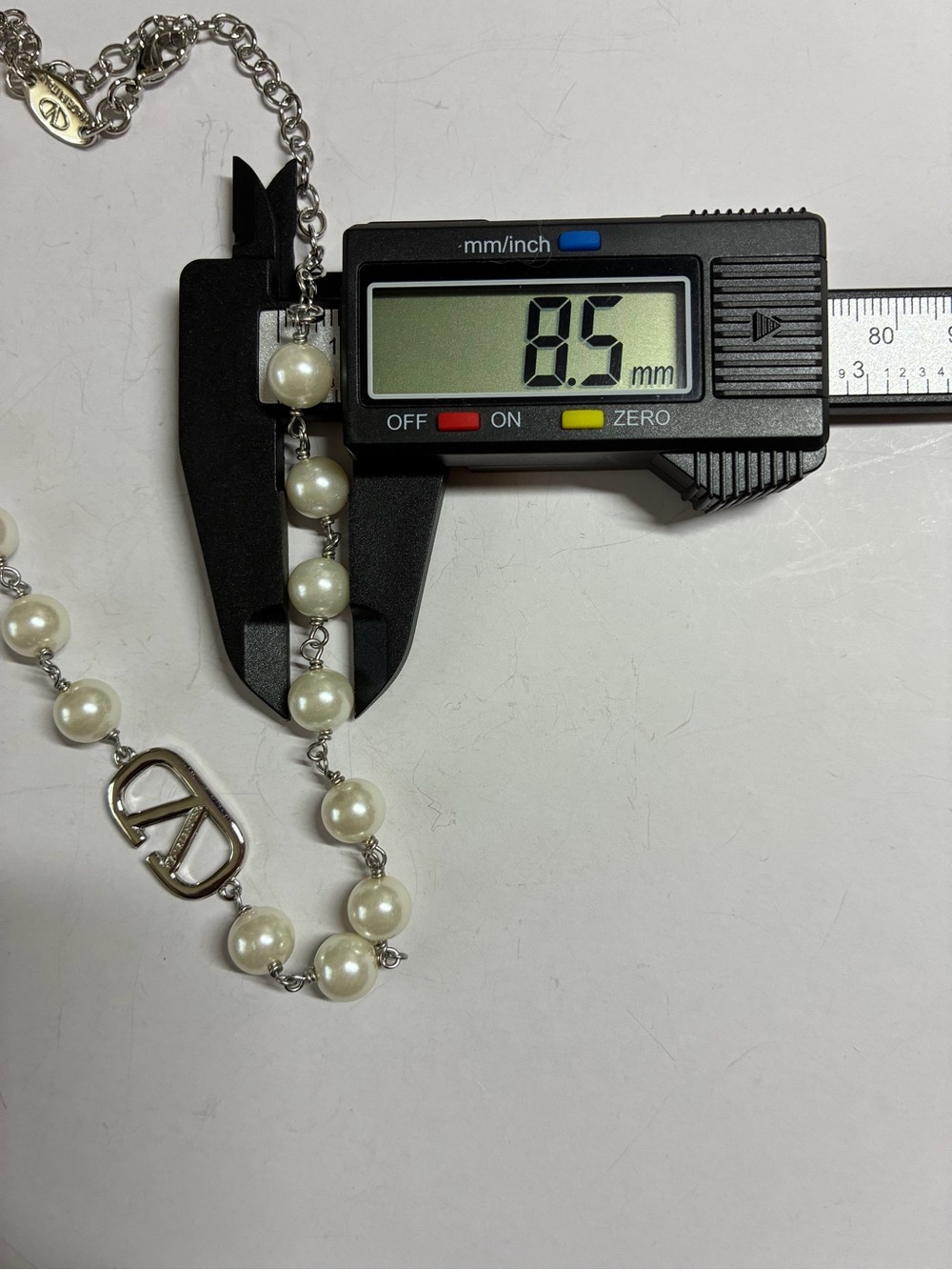 Silver and White Pearl Valentino V-Emblem Necklace - Picture 8 of 11